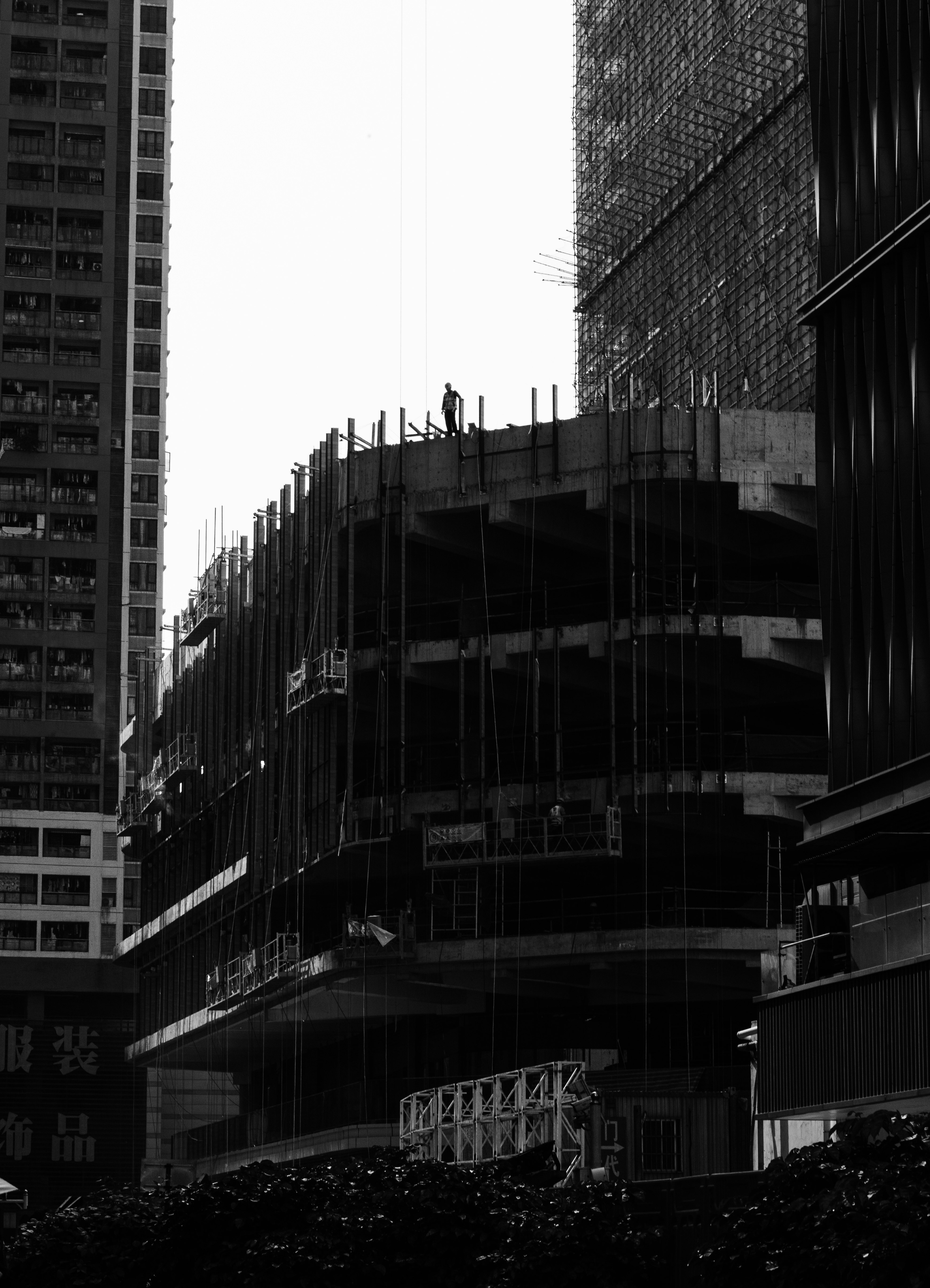 grayscale photo of high rise buildings